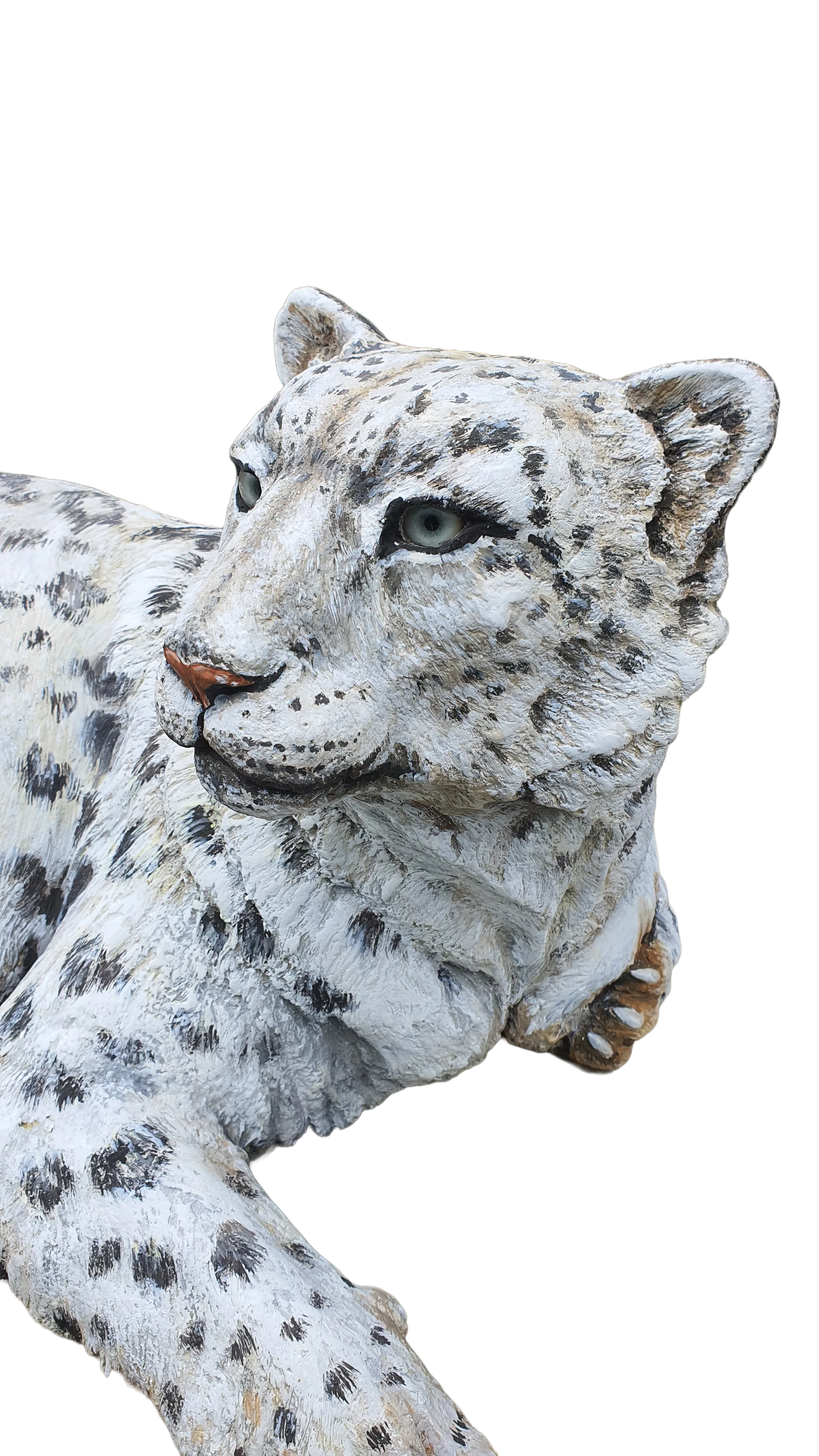 Close view of the snow leopard face, painted eyes, and hand-worked concrete fur.